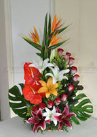 mixed tropical flower arrangement